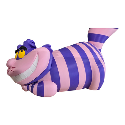 Whimsical purple‑pink striped cat collectible for shelf or desk