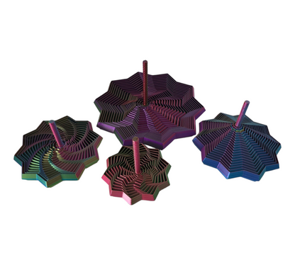 layered sensory star close‑up with metallic gradient; fidget star toy showing rippled concentric pattern; tri‑colour swirl star for visual and auditory stimulation; calming desk fidget star with stepped geometry; large tactile star for ASMR and relaxation; shiny gradient fidget star in motion