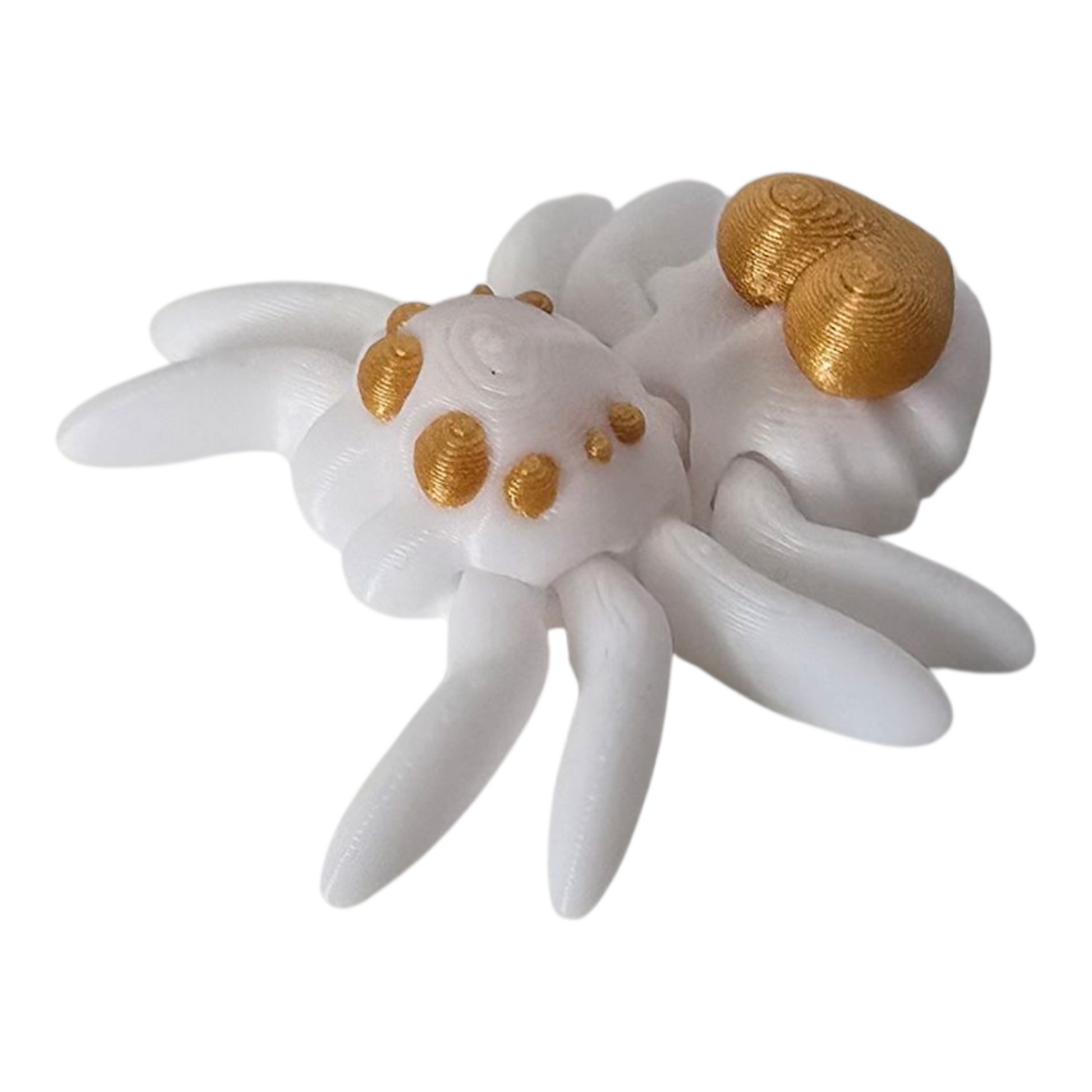 a 3d printed white spider with a gold heart on its back. it is a flexible sensory fidget animal. FDM 3d printed with PLA filament
